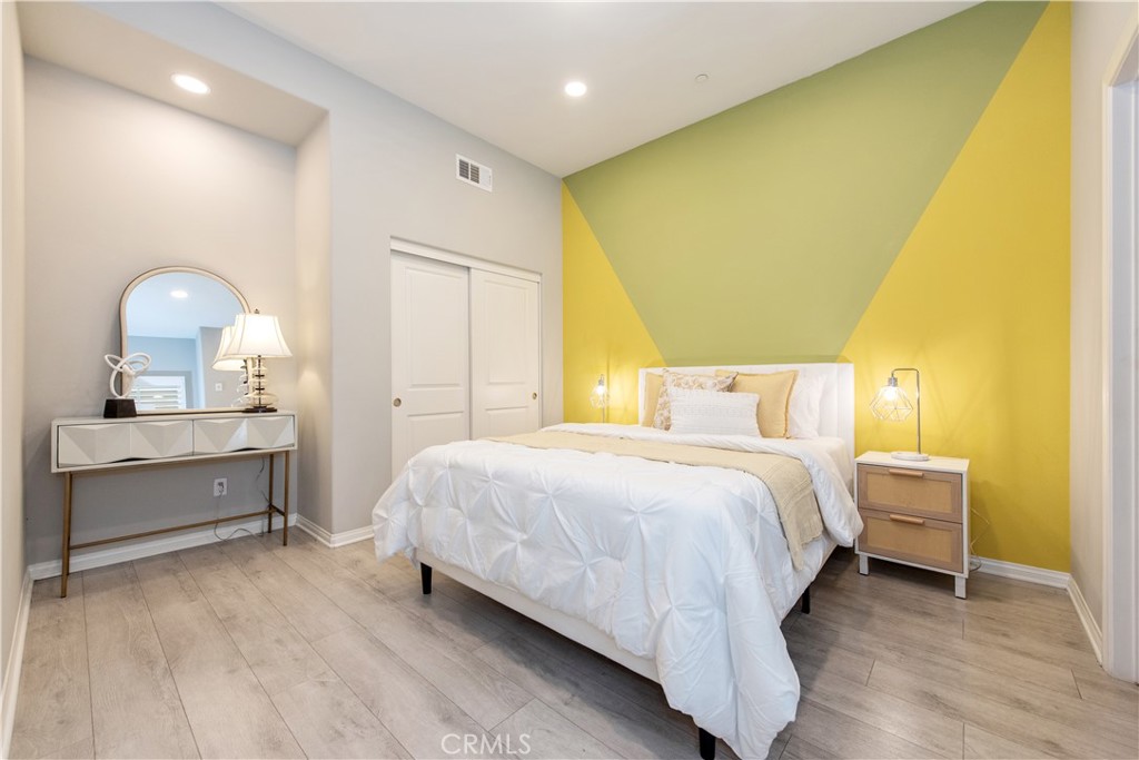 68 Origin Irvine, CA 92618 - Photo 5 of 43 a bedroom with a bed and a table