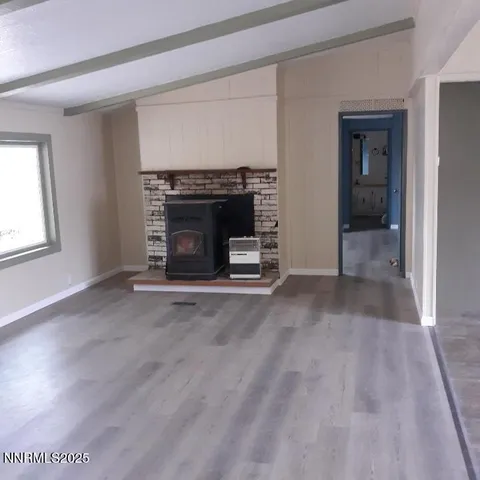 a kitchen with a stove and a refrigerator