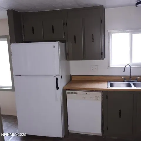 a view of a hallway with entryway