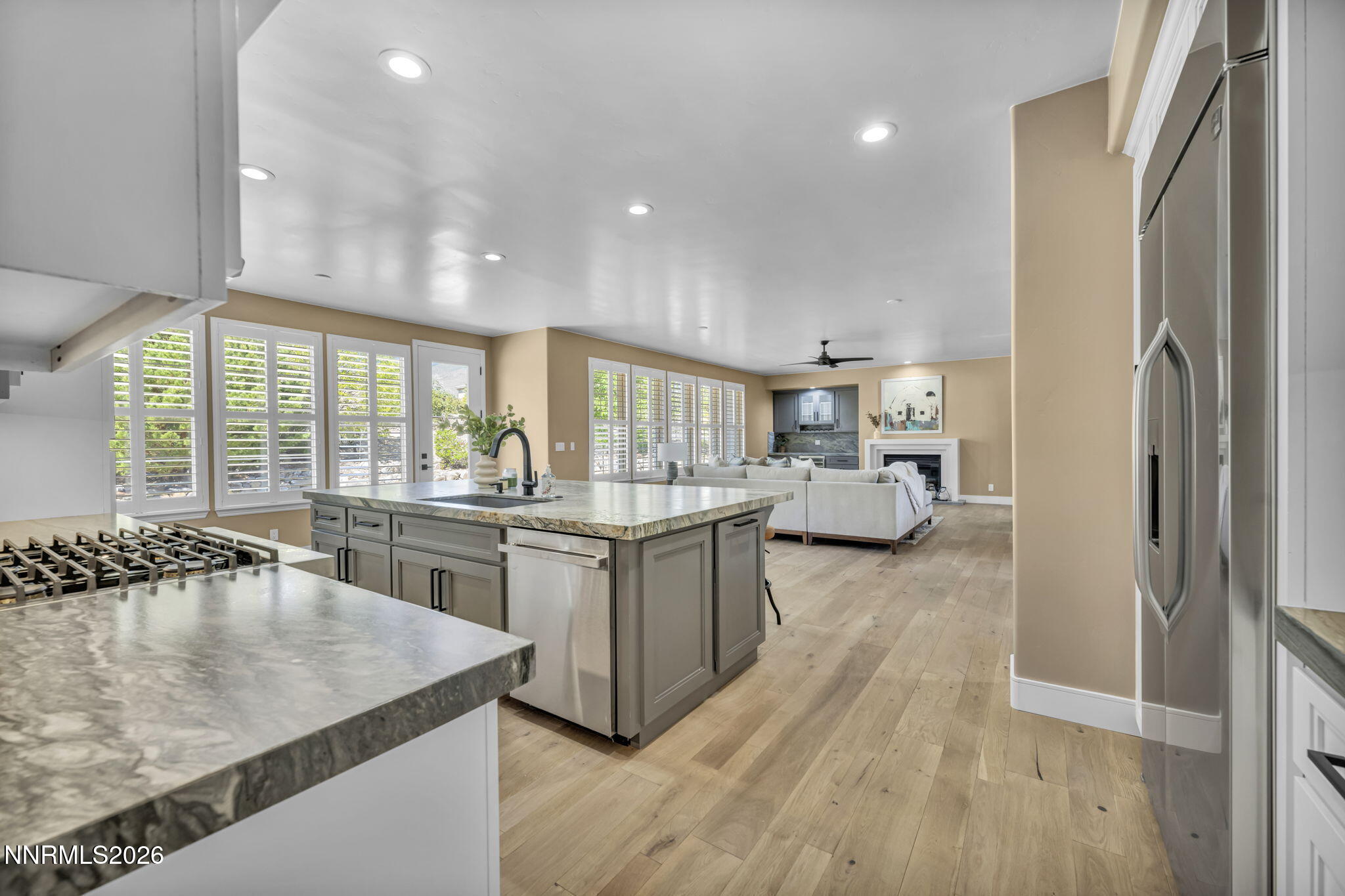 2965 Roundrock Court Reno, NV 89511 - Photo 12 of 40 a kitchen with sink refrigerator and outdoor view