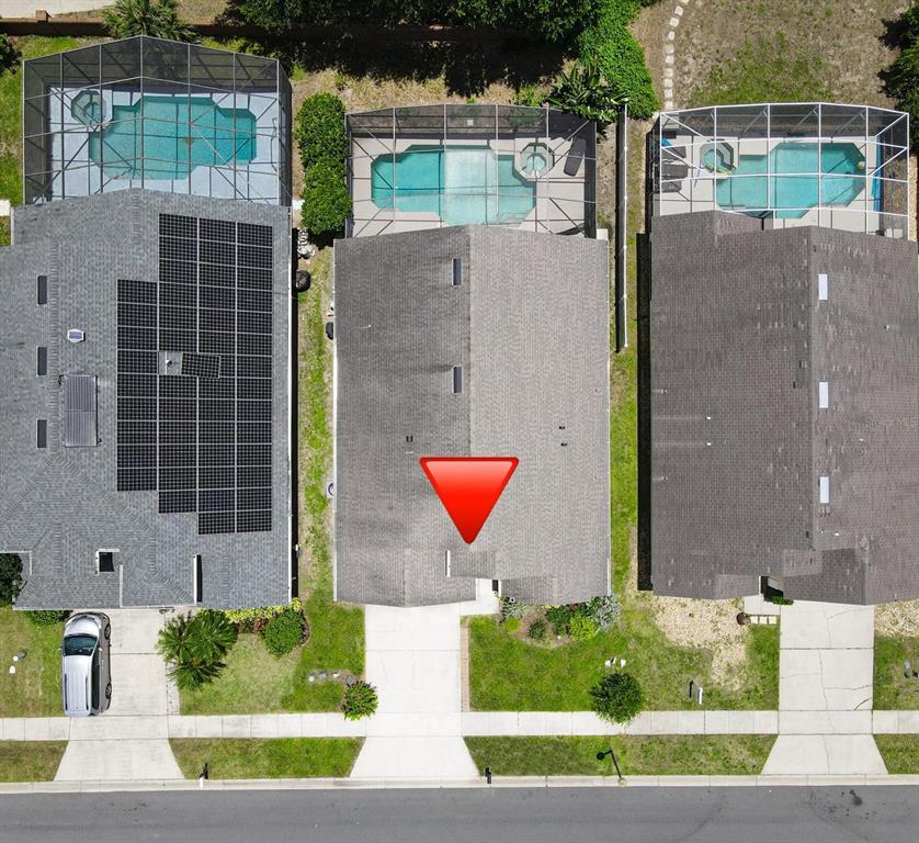 2807 Playing Otter Court Kissimmee, FL 34747 - Photo 24 of 25 a aerial view of a house with a yard and potted plants
