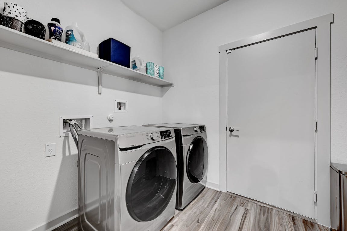 7517 Peggie Nell Drive Austin, TX 78724 - Photo 26 of 37 a utility room with dryer and washer