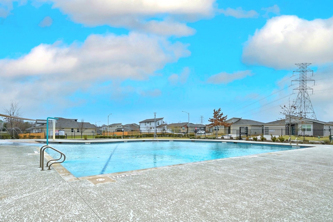 7517 Peggie Nell Drive Austin, TX 78724 - Photo 28 of 37 a view of a swimming pool and an outdoor seating