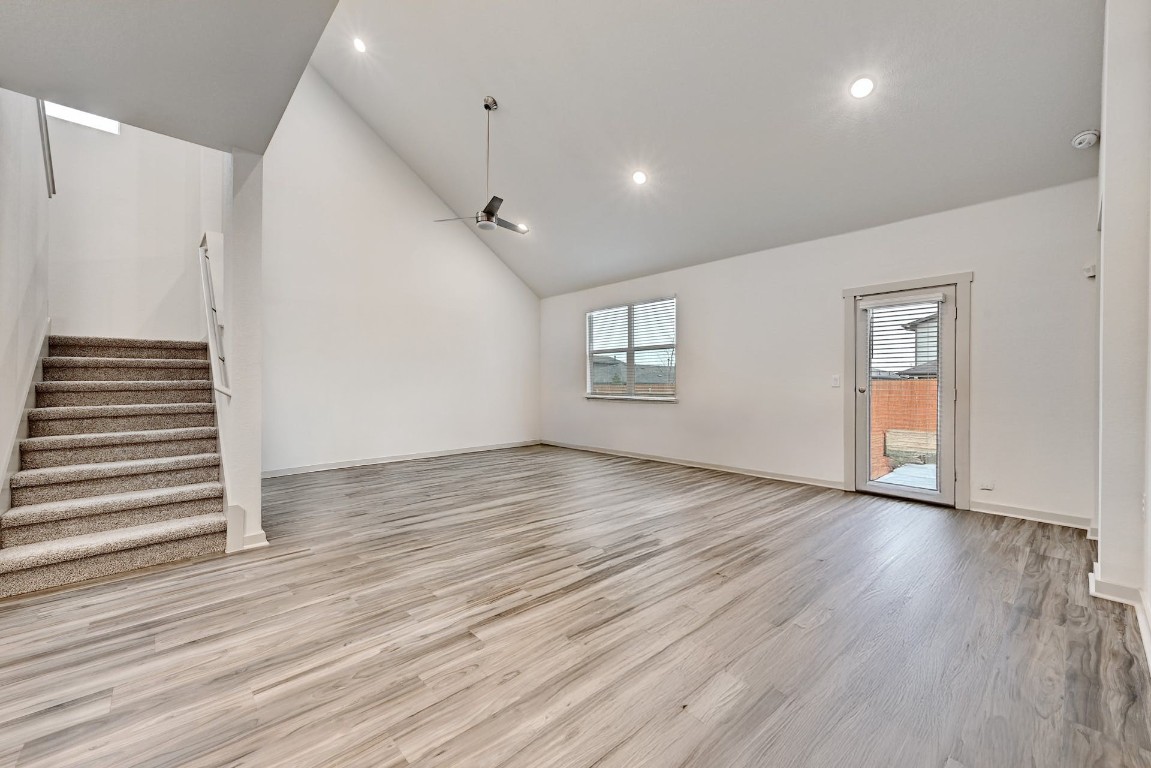 7517 Peggie Nell Drive Austin, TX 78724 - Photo 36 of 37 an empty room with wooden floor and windows