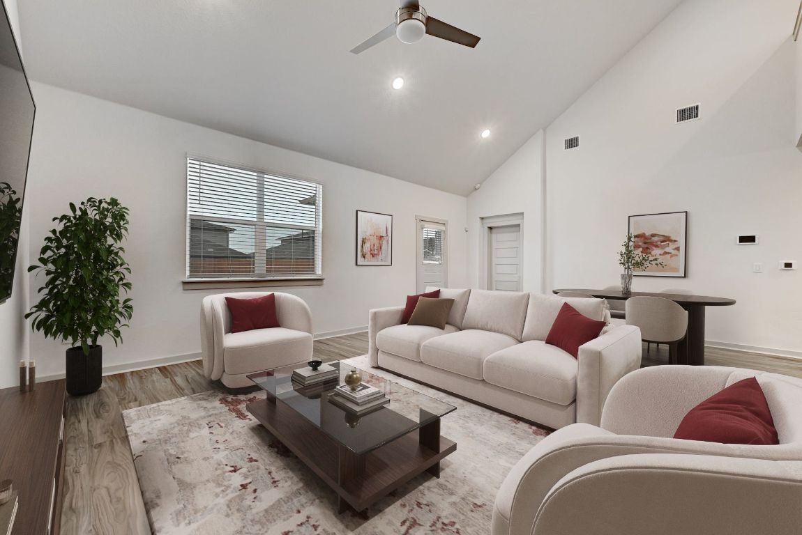 7517 Peggie Nell Drive Austin, TX 78724 - Photo 4 of 37 a living room with furniture potted plant and a window
