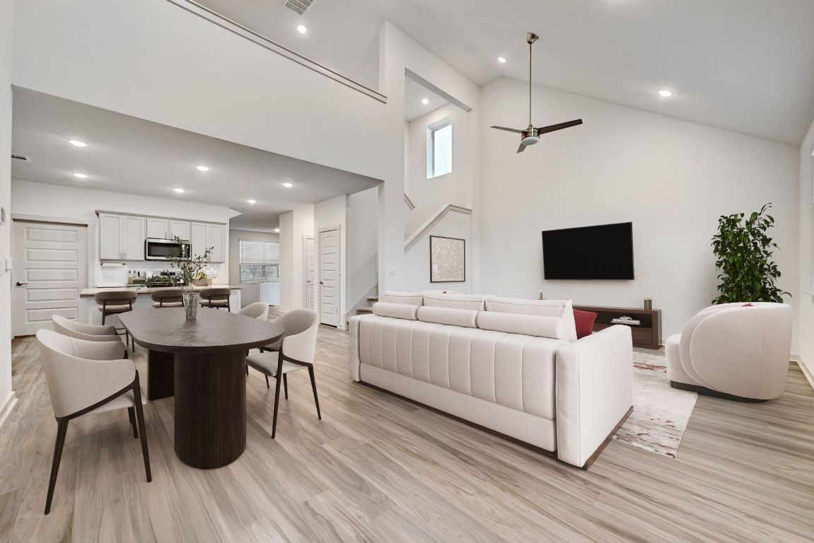 7517 Peggie Nell Drive Austin, TX 78724 - Photo 37 of 37 a living room with furniture a table and a flat screen tv