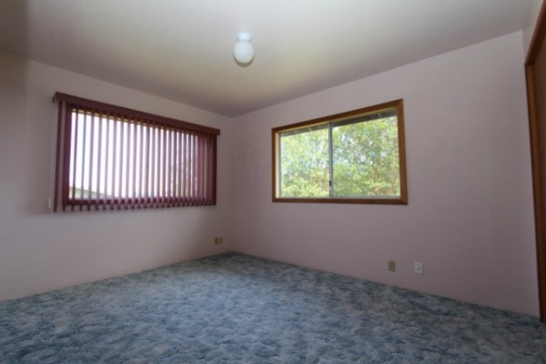 18-7844 Kolika Road Mountain View, HI 96771 - Photo 8 of 10 an empty room with windows