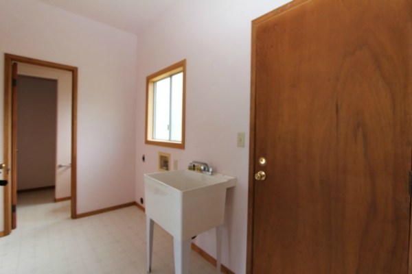 18-7844 Kolika Road Mountain View, HI 96771 - Photo 9 of 10 a bathroom with a sink and mirror