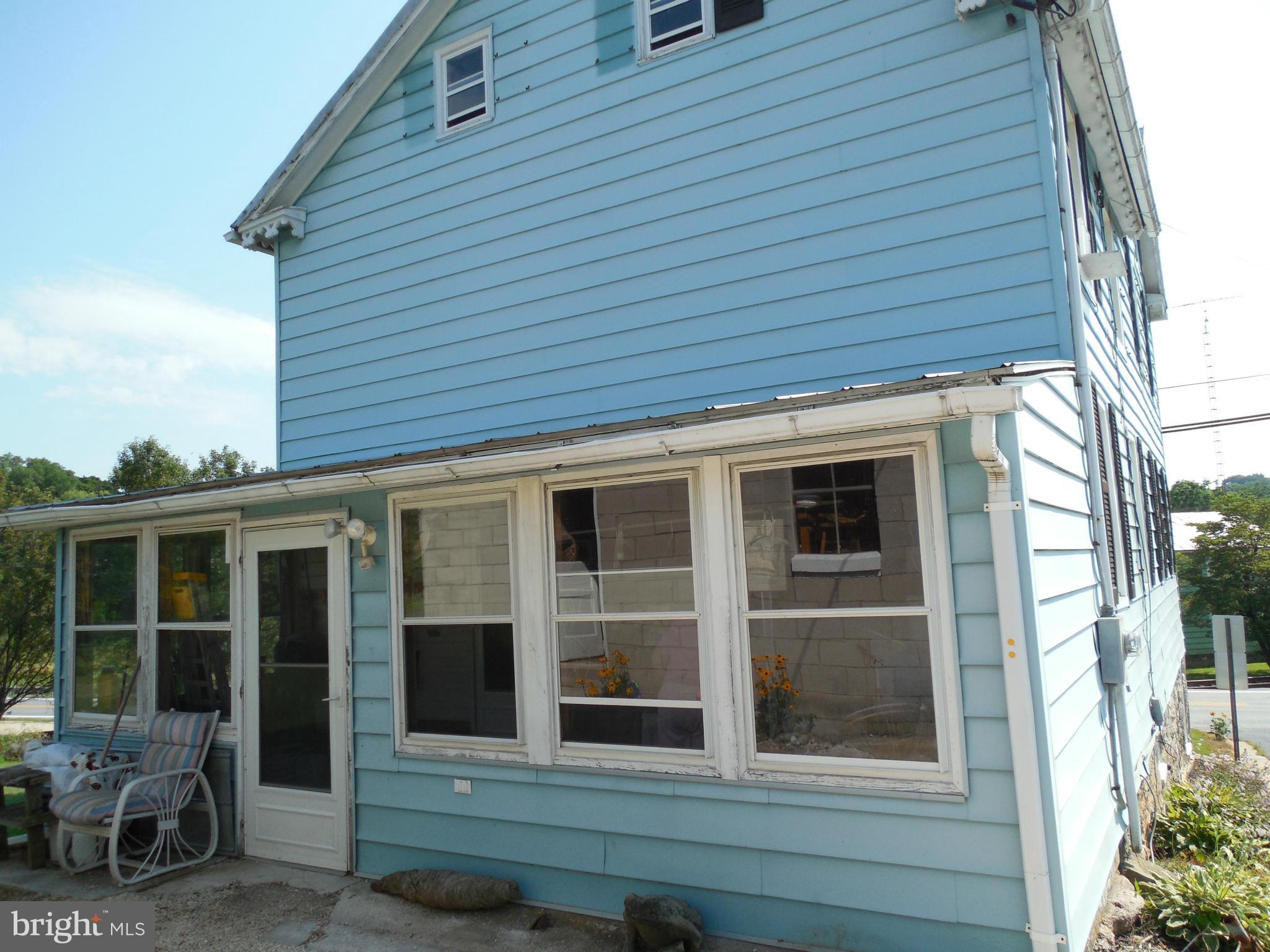 416 High Street New Windsor, MD 21776 - Photo 4 of 20 Back of home with enclosed porch