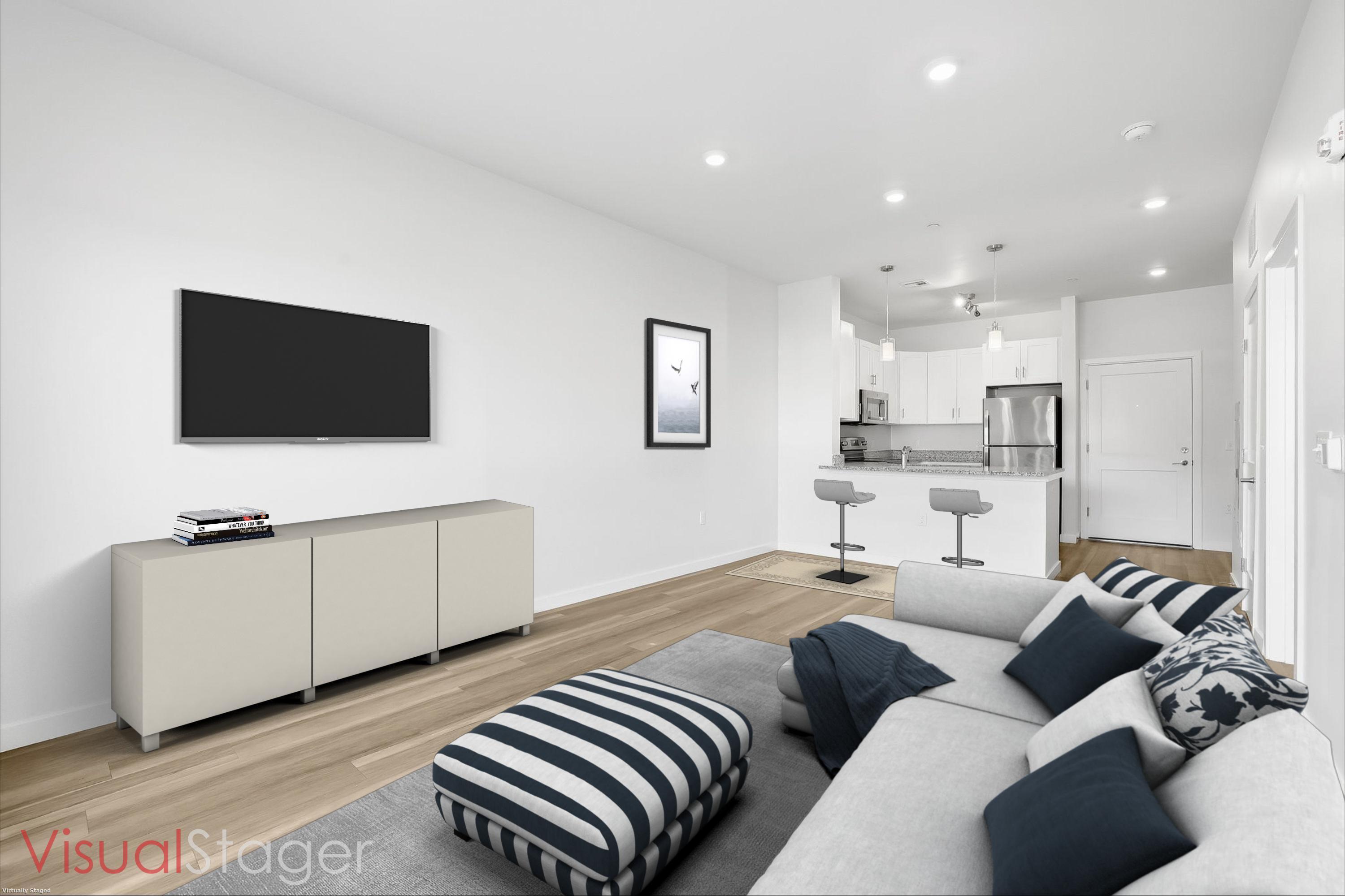 71 Connecticut Avenue, Unit 204 Norwalk, CT 06850 - Photo 11 of 19 a living room with furniture and a flat screen tv