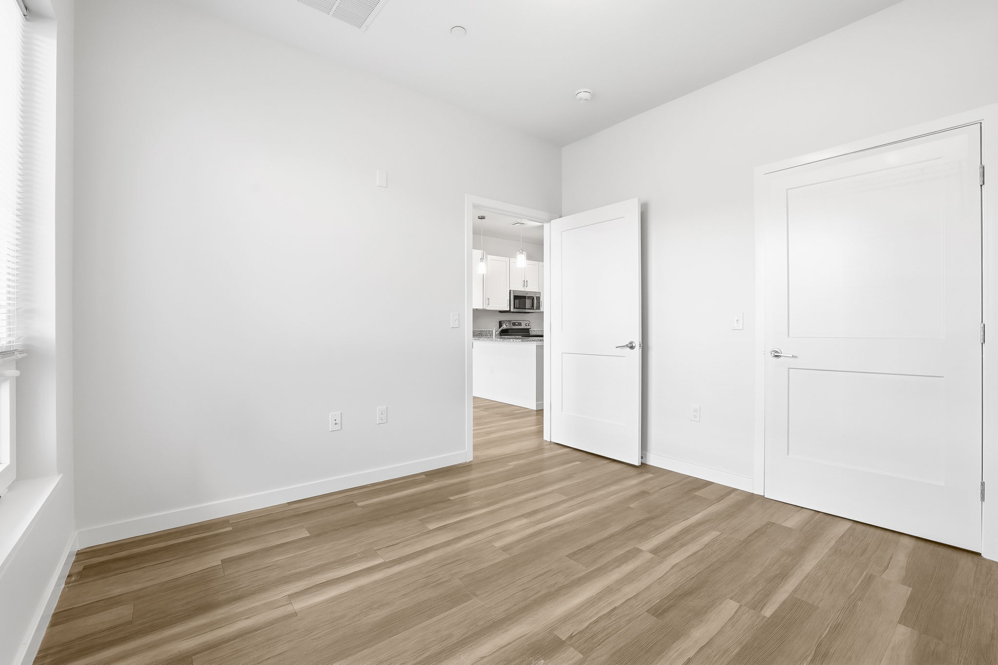 71 Connecticut Avenue, Unit 204 Norwalk, CT 06850 - Photo 17 of 19 a view of empty room with wooden floor