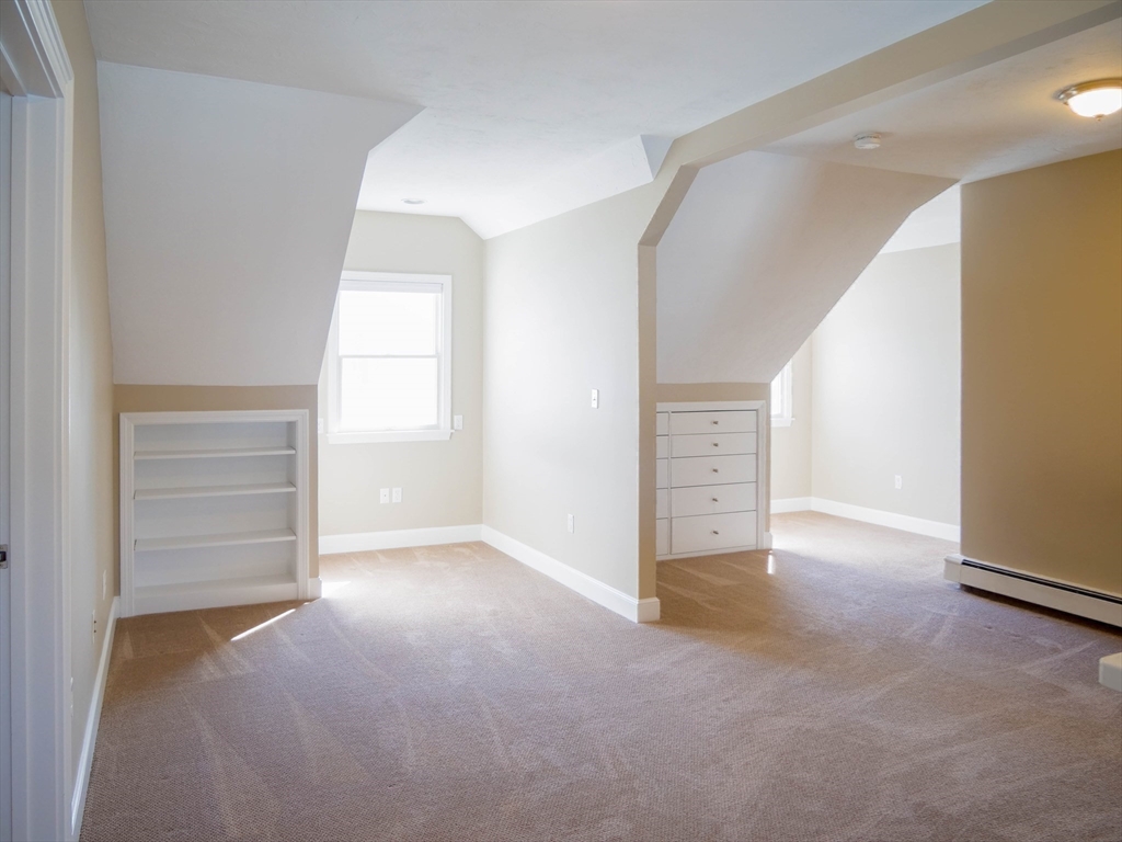 97 Hartwell Road Bedford, MA 01730 - Photo 26 of 42 an empty room with windows and closet