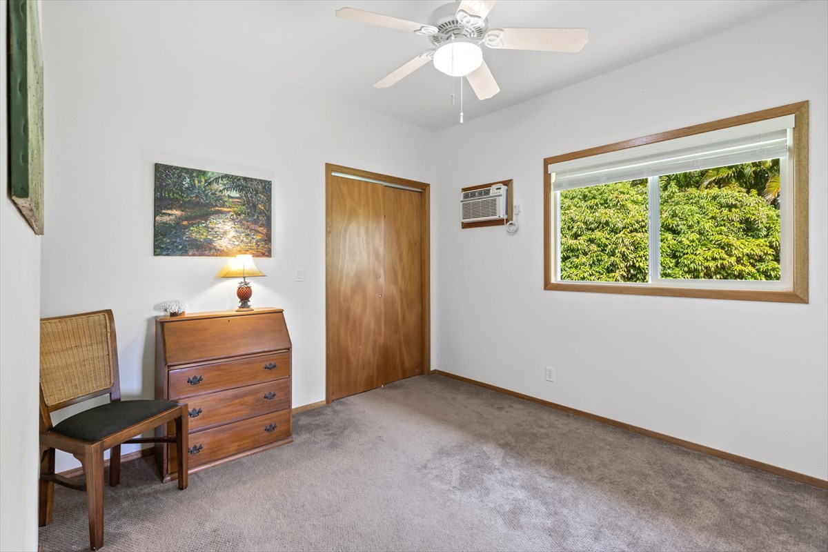 6154 Olohena Road, Unit 2 Kapaa, HI 96746 - Photo 12 of 27 a view of room with furniture and a window