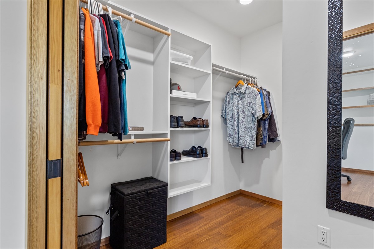 6154 Olohena Road, Unit 2 Kapaa, HI 96746 - Photo 21 of 27 a view of walk in closet with clothes and shoes
