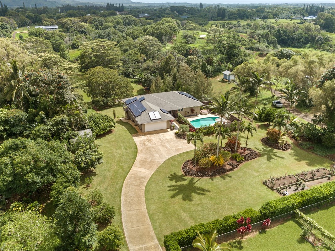 6154 Olohena Road, Unit 2 Kapaa, HI 96746 - Photo 3 of 27 an aerial view of a residential houses with outdoor space