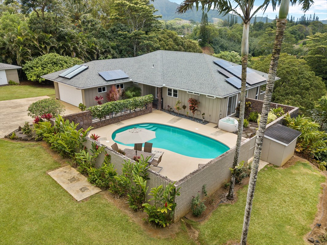 6154 Olohena Road, Unit 2 Kapaa, HI 96746 - Photo 5 of 27 an aerial view of a house with swimming pool and patio