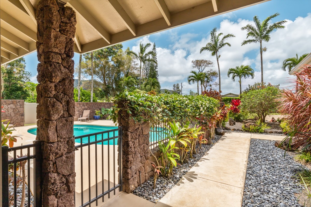 6154 Olohena Road, Unit 2 Kapaa, HI 96746 - Photo 8 of 27 a front view of a house having yard