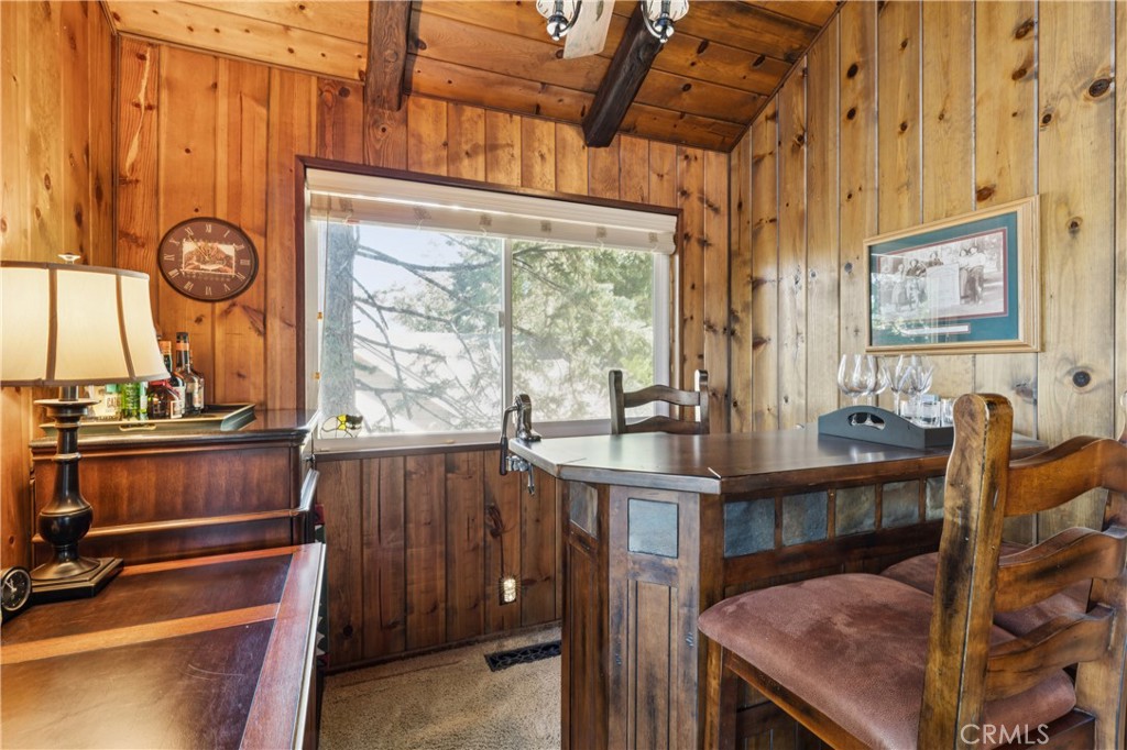 460 Pioneer Road Lake Arrowhead, CA 92352 - Photo 20 of 48 a view of a room with workspace and windows
