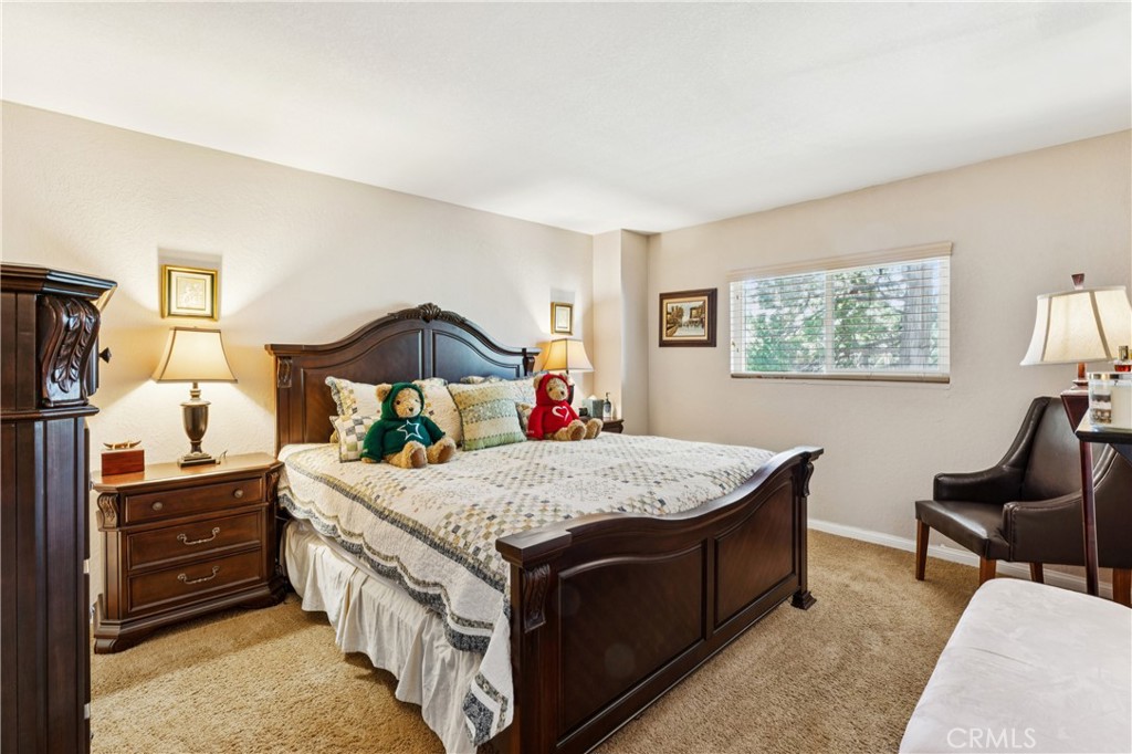 460 Pioneer Road Lake Arrowhead, CA 92352 - Photo 25 of 48 a bedroom with a bed and dresser