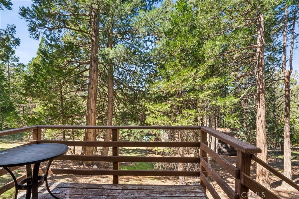 460 Pioneer Road Lake Arrowhead, CA 92352 - Photo 35 of 48 a view of a two chairs and table in the balcony