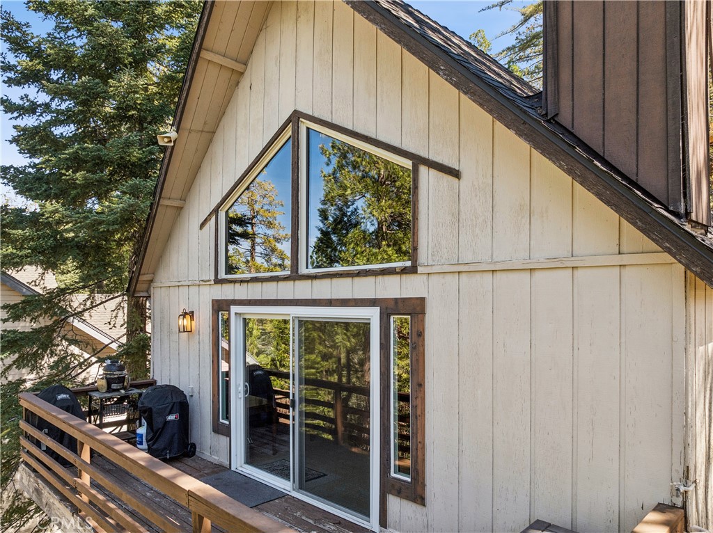 460 Pioneer Road Lake Arrowhead, CA 92352 - Photo 38 of 48 a view of a house with a large window