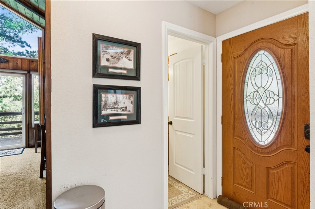 460 Pioneer Road Lake Arrowhead, CA 92352 - Photo 9 of 48 a view of a hallway with entryway