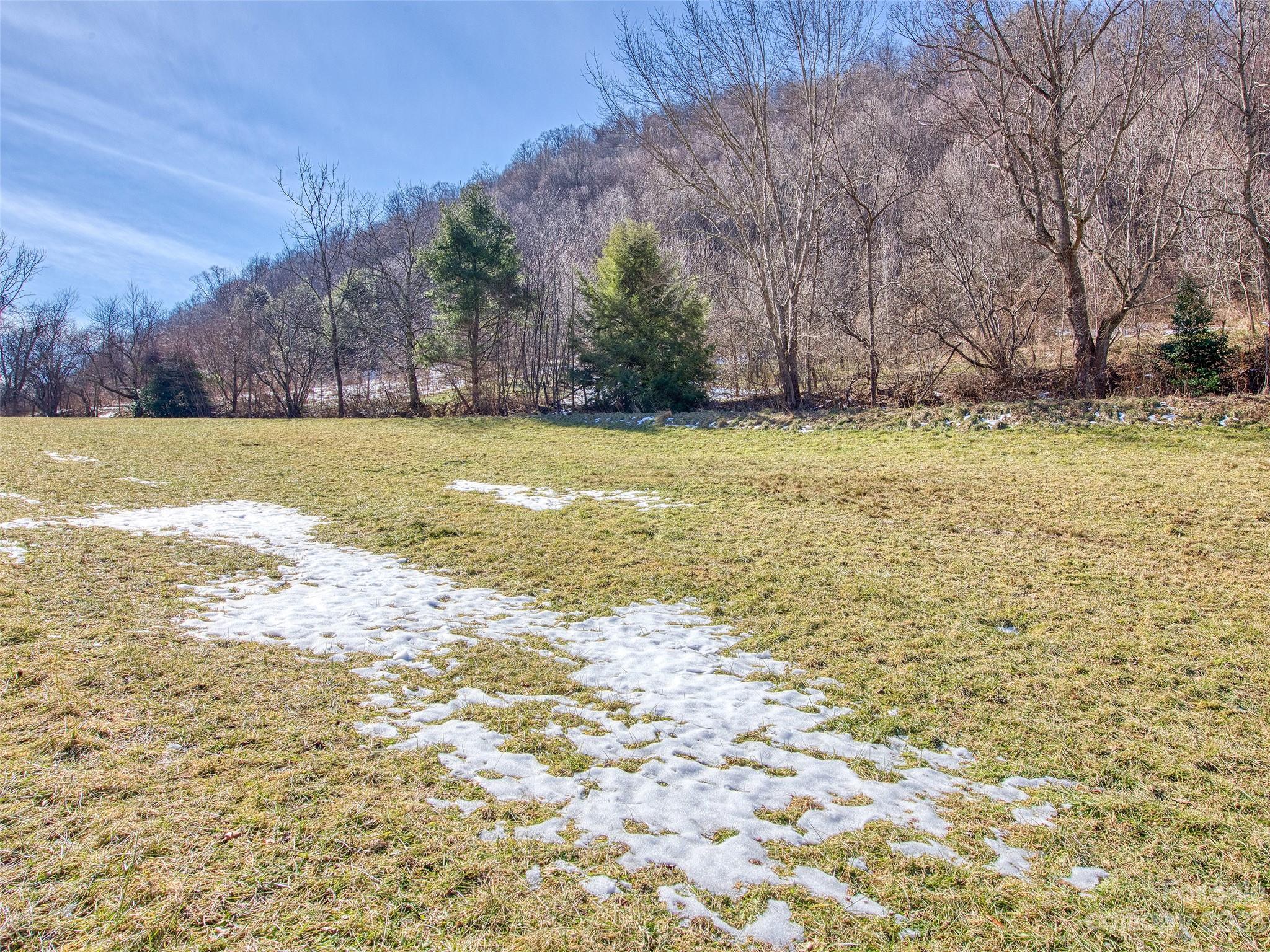 Lot #2-and Lot#2-and Road Clyde, NC 28721 - Photo 8 of 18 a view of a swimming pool with an outdoor space