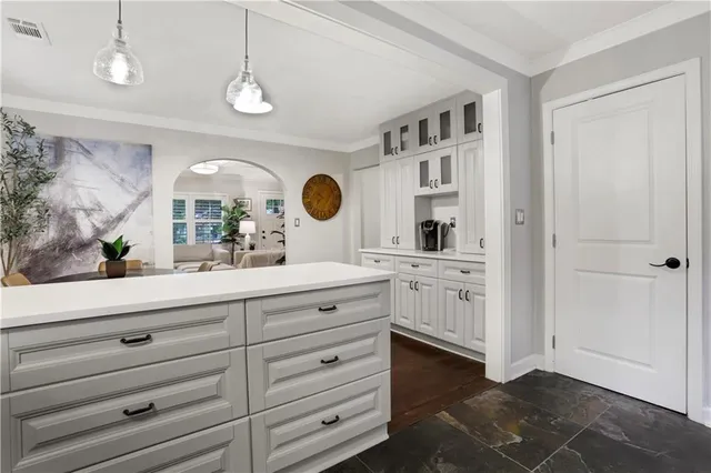 a view of a flower in a corridor