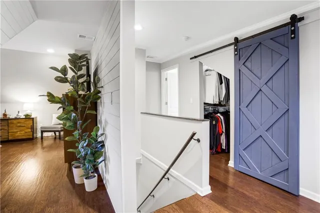 a room with gym equipment and a large window