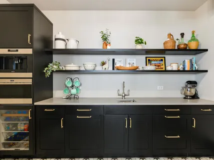 a view of kitchen with furniture and wooden floor