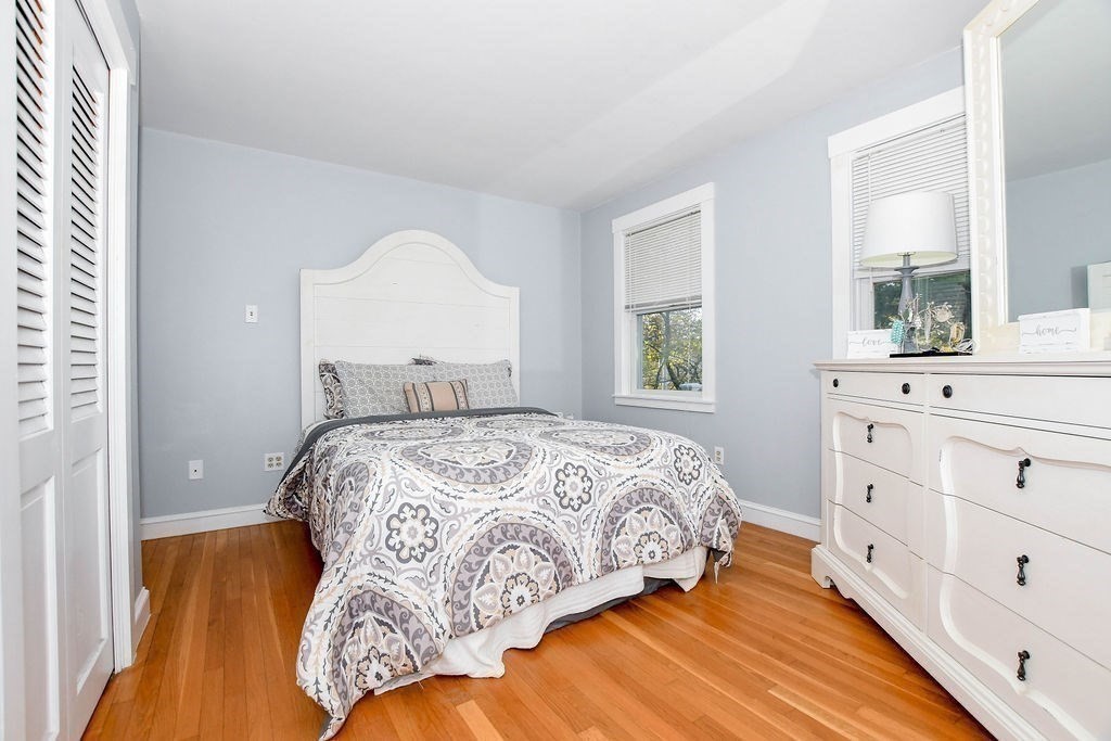 150 Herring Pond Road Bourne, MA 02532 - Photo 18 of 42 a bedroom with a bed and a window