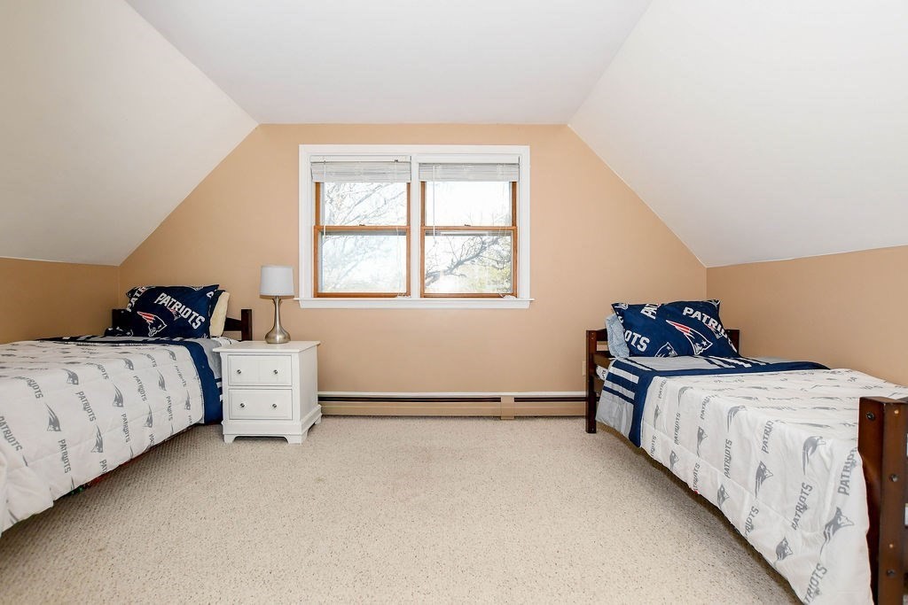 150 Herring Pond Road Bourne, MA 02532 - Photo 23 of 42 a bedroom with a bed and window