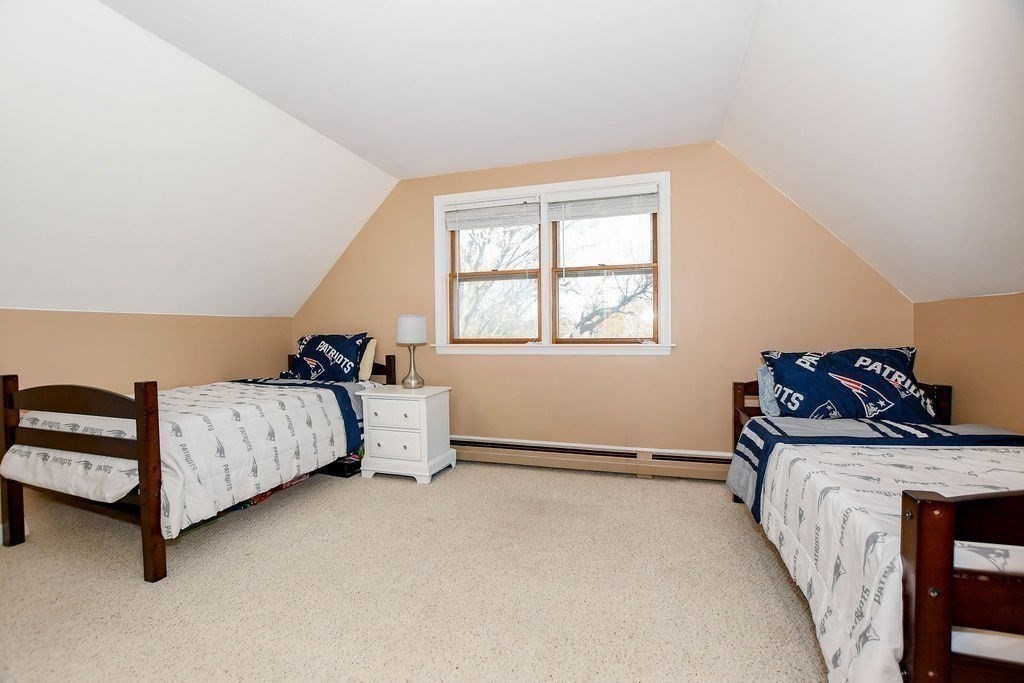 150 Herring Pond Road Bourne, MA 02532 - Photo 24 of 42 a bed room with a bed and a window