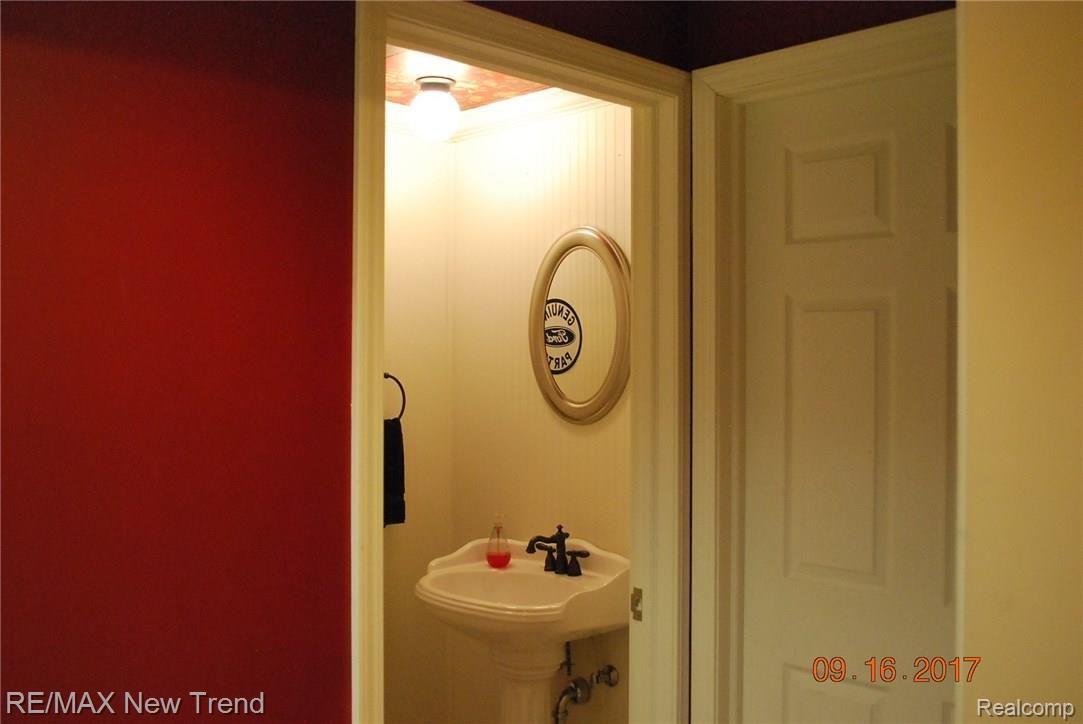 21680 River Ridge Trail, Unit 197 Farmington, MI 48335 - Photo 11 of 17 LOWER LEVEL POWDER ROOM