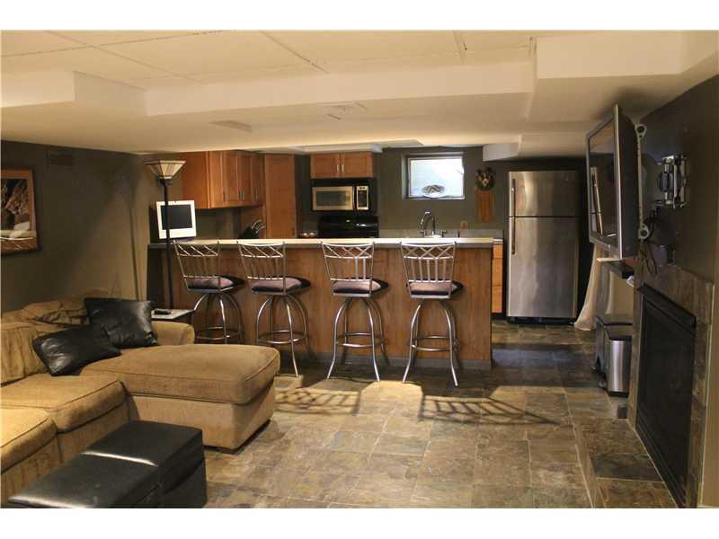 1575 Williamsburg Road Mt. Lebanon, PA 15243 - Photo 11 of 19 Family Room. Lower leve fam room, with full fab kitchen & FP...great for entertaining!