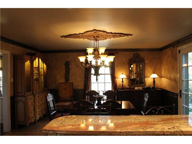 Dining Room. Room for everyone in this spacious & bright DR with French door to patio