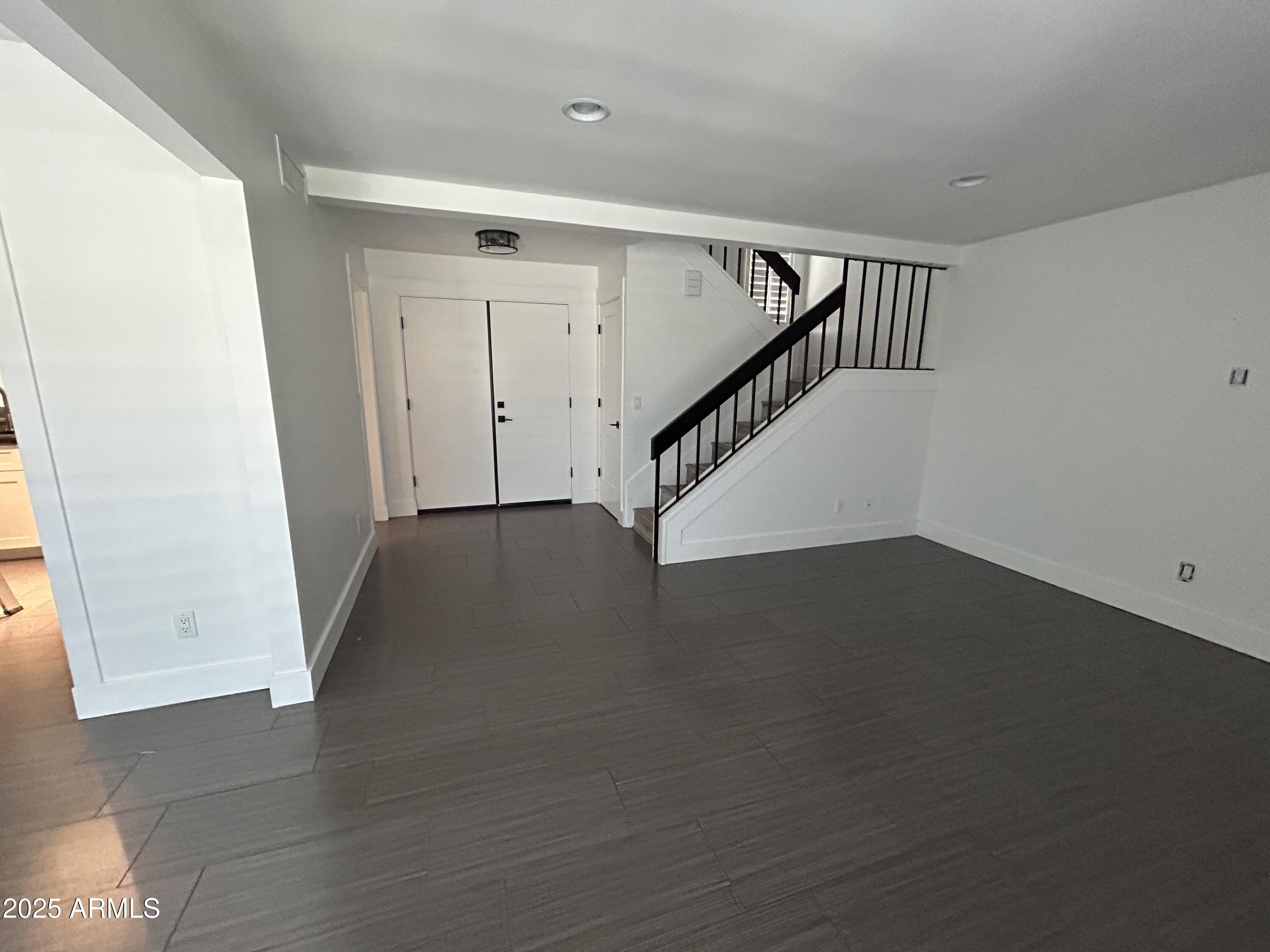 320 East Larkspur Lane Tempe, AZ 85288 - Photo 5 of 16 a view of a hallway with staircase