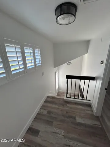 a view of entryway with wooden floor