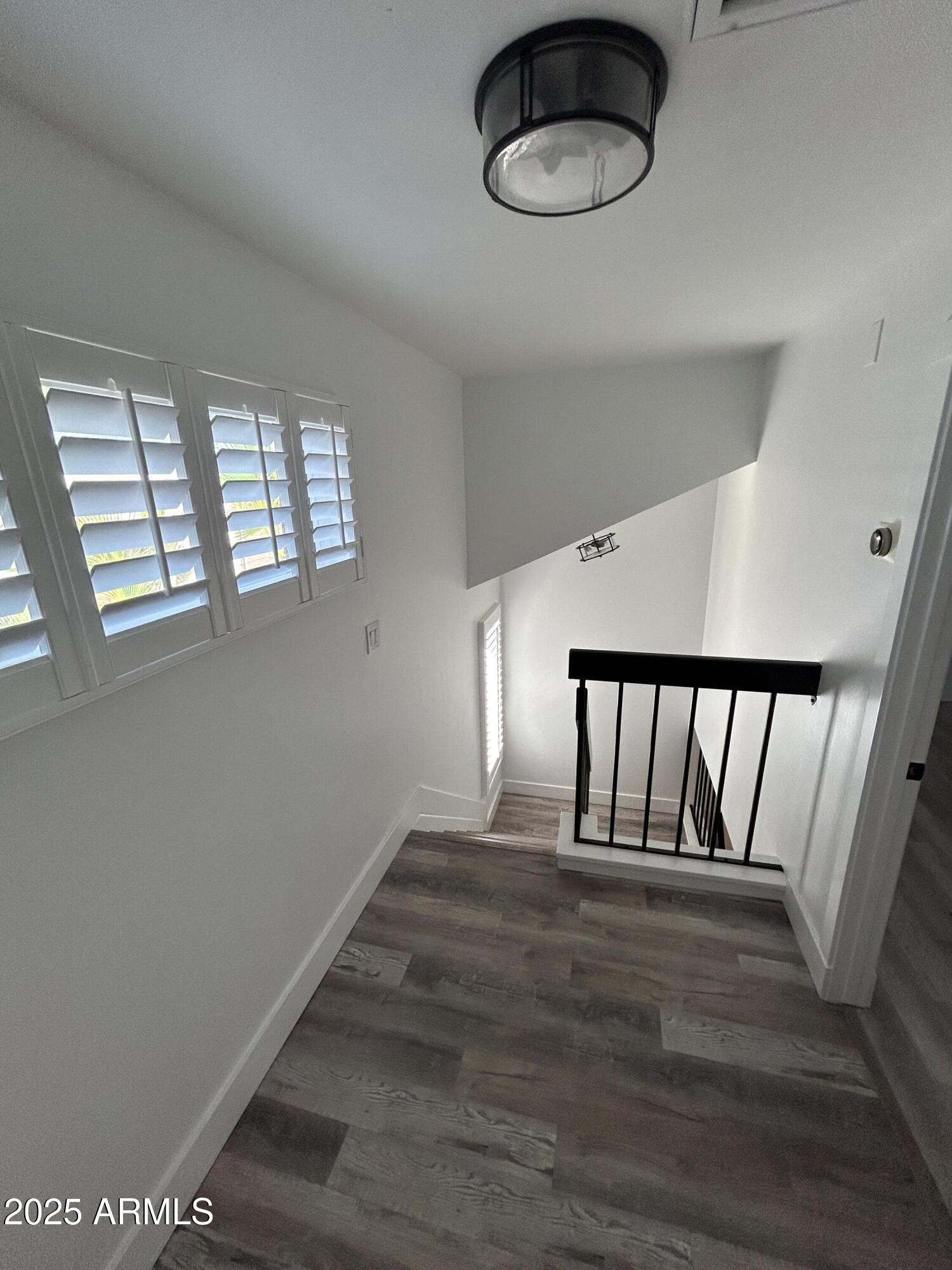 320 East Larkspur Lane Tempe, AZ 85288 - Photo 7 of 16 a view of entryway with wooden floor