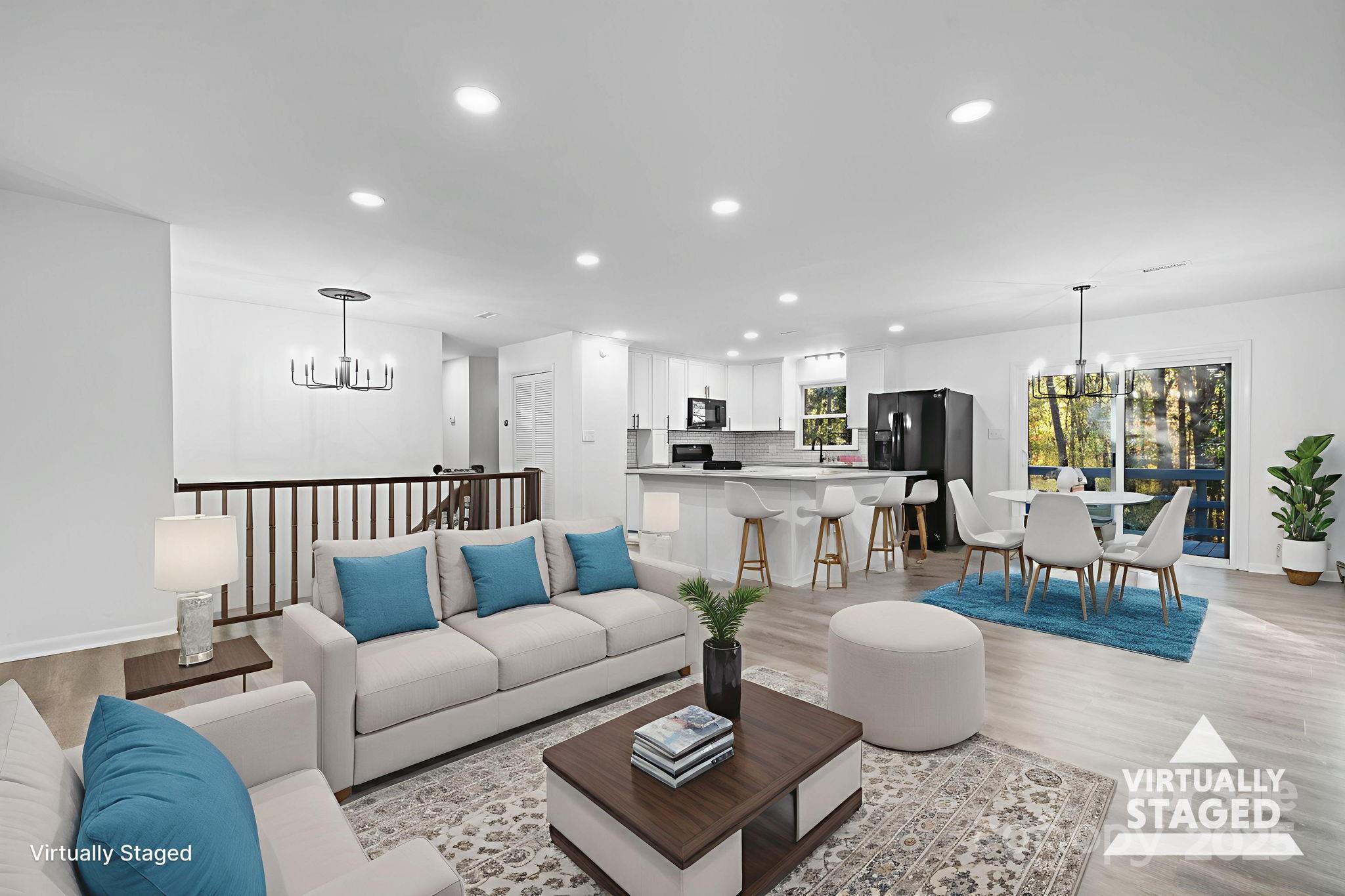 1185 10th St Pl Circle Northwest Hickory, NC 28601 - Photo 14 of 38 a living room with lots of furniture and kitchen view