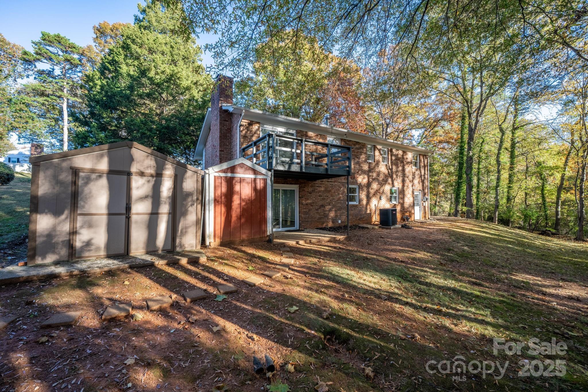 1185 10th St Pl Circle Northwest Hickory, NC 28601 - Photo 33 of 38 a view of a house with a yard