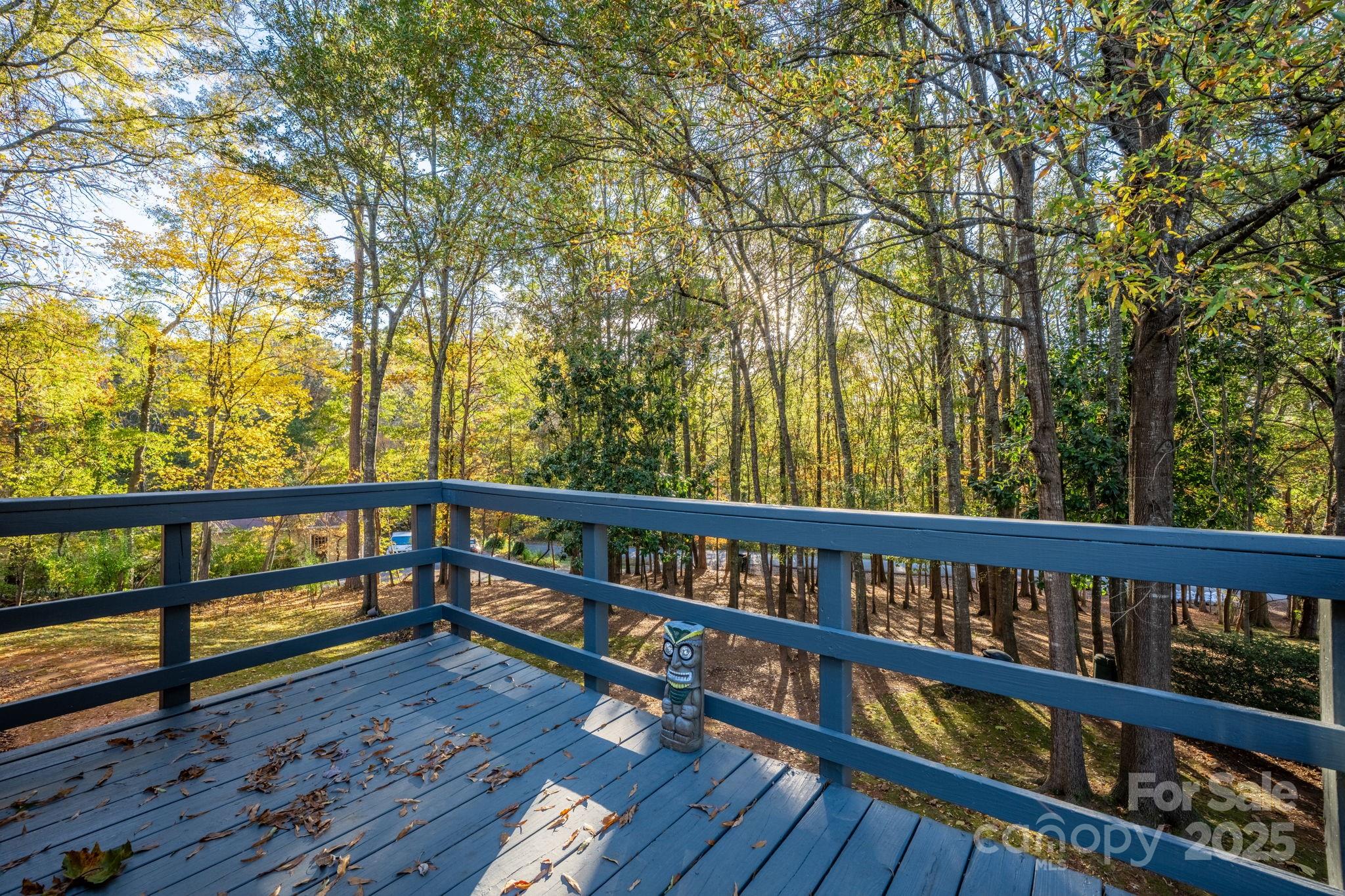 1185 10th St Pl Circle Northwest Hickory, NC 28601 - Photo 38 of 38 a view of roof deck with wooden floor and fence