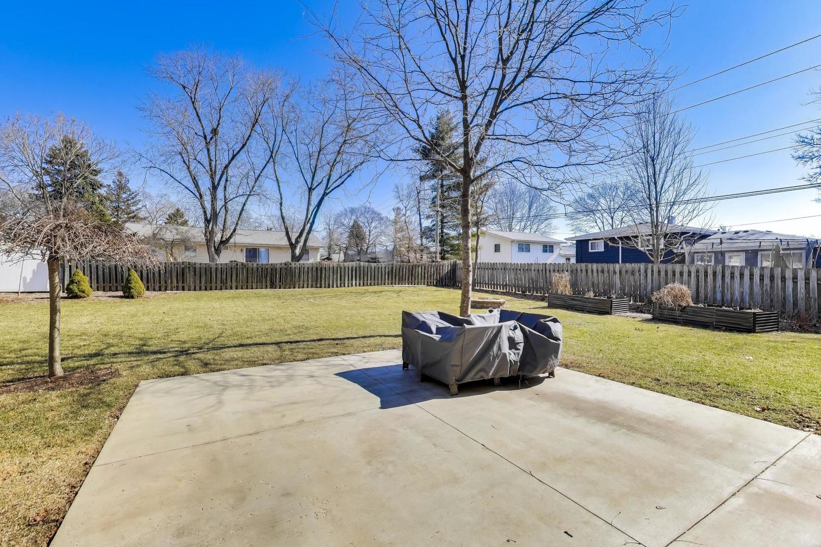 1445 Stoddard Avenue Wheaton, IL 60187 - Photo 36 of 38 a view of swimming pool with garden and trees