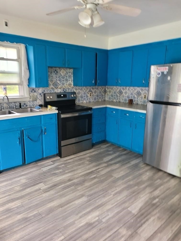 111 Plimpton Street Southbridge, MA 01550 - Photo 7 of 7 a kitchen with stainless steel appliances granite countertop a refrigerator sink and cabinets