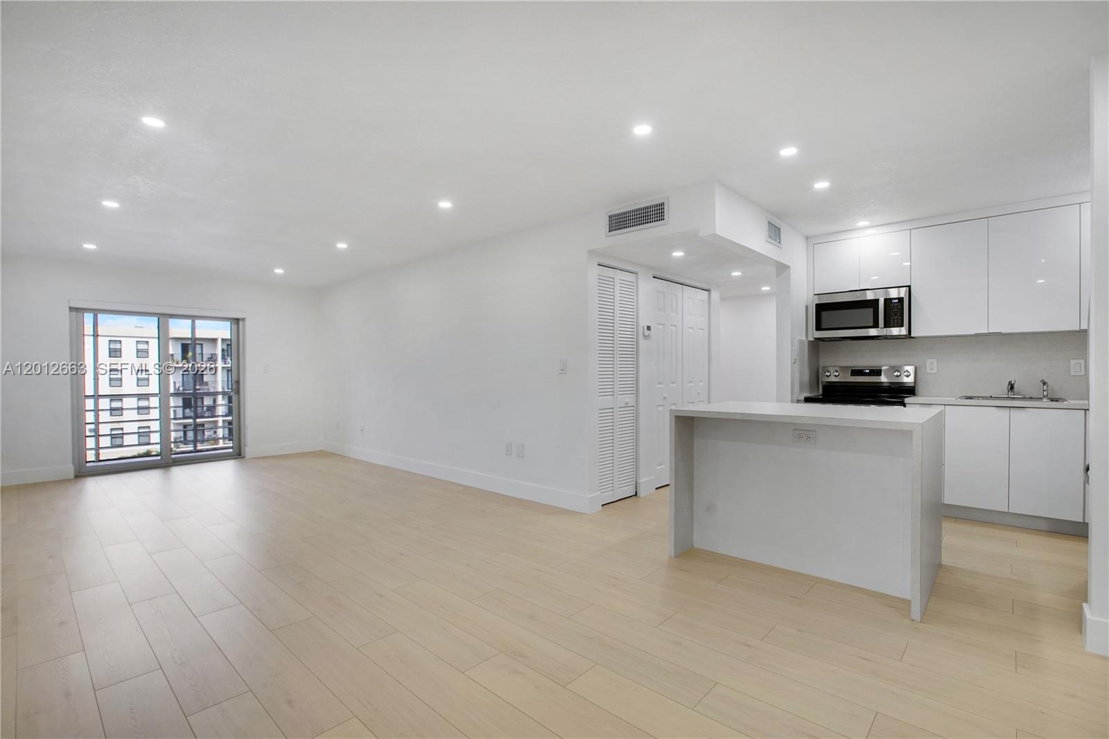 4670 West 13th Lane, Unit 411 Hialeah, FL 33012 - Photo 2 of 28