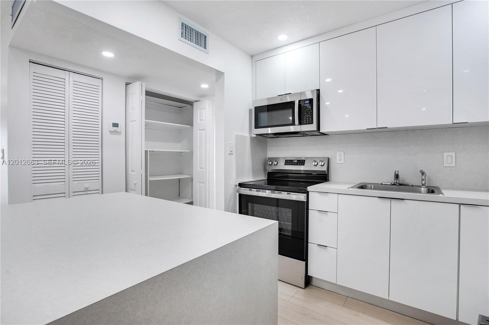 4670 West 13th Lane, Unit 411 Hialeah, FL 33012 - Photo 5 of 28