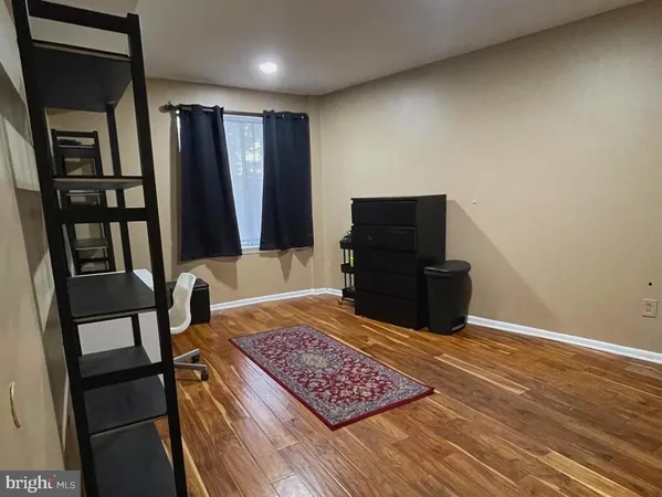a view of a hallway with workspace
