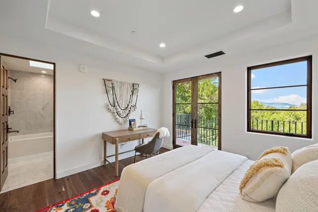 a bathroom with a shower and a sink