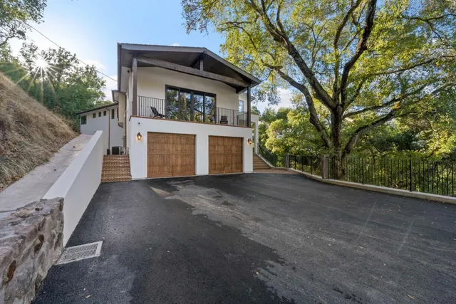 a house with trees in front of it