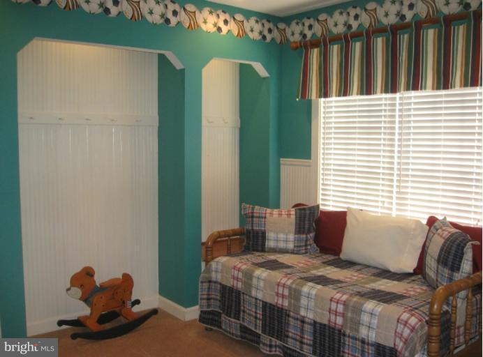 10803 Catron Road Perry Hall, MD 21128 - Photo 14 of 30 a bedroom with a bed and a window